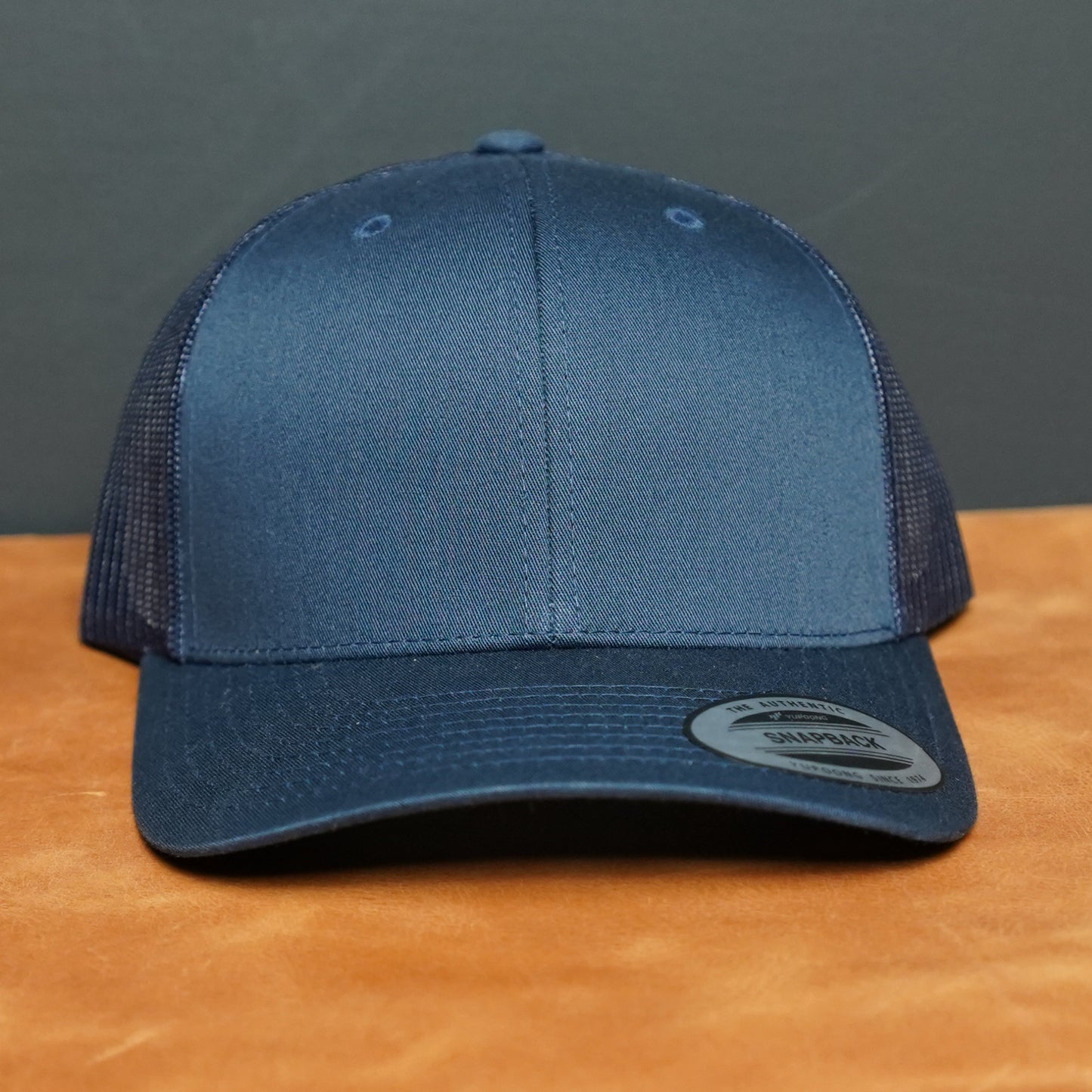 Custom Leather Patch Yupoong Trucker Hat + Your Logo