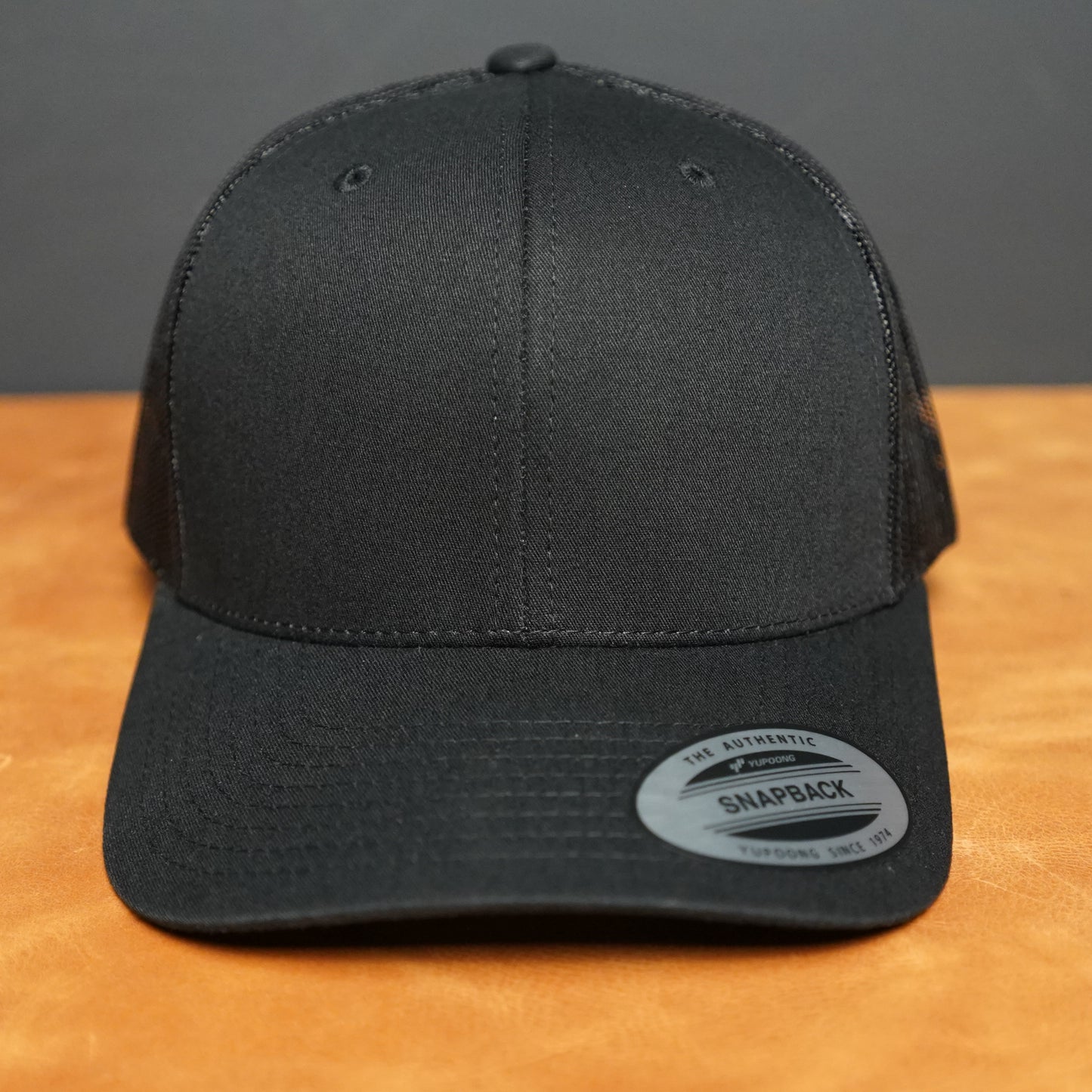 Custom Leather Patch Yupoong Trucker Hat + Your Logo