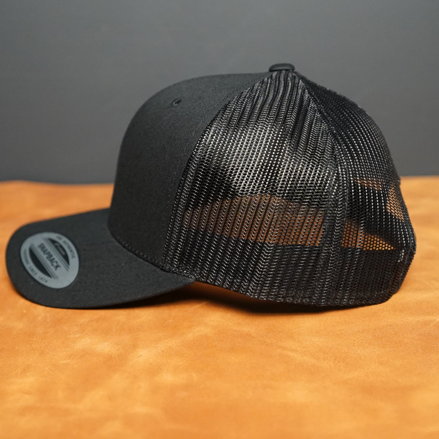 Custom Leather Patch Yupoong Trucker Hat + Your Logo